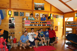 boys on cabbin porch